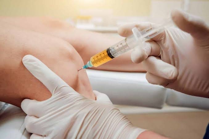 PRP injection being given into a patient’s knee at RMC Mangalore