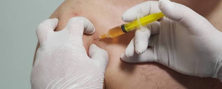 PRP injection being given into a patient’s shoulder at RMC Mangalore
